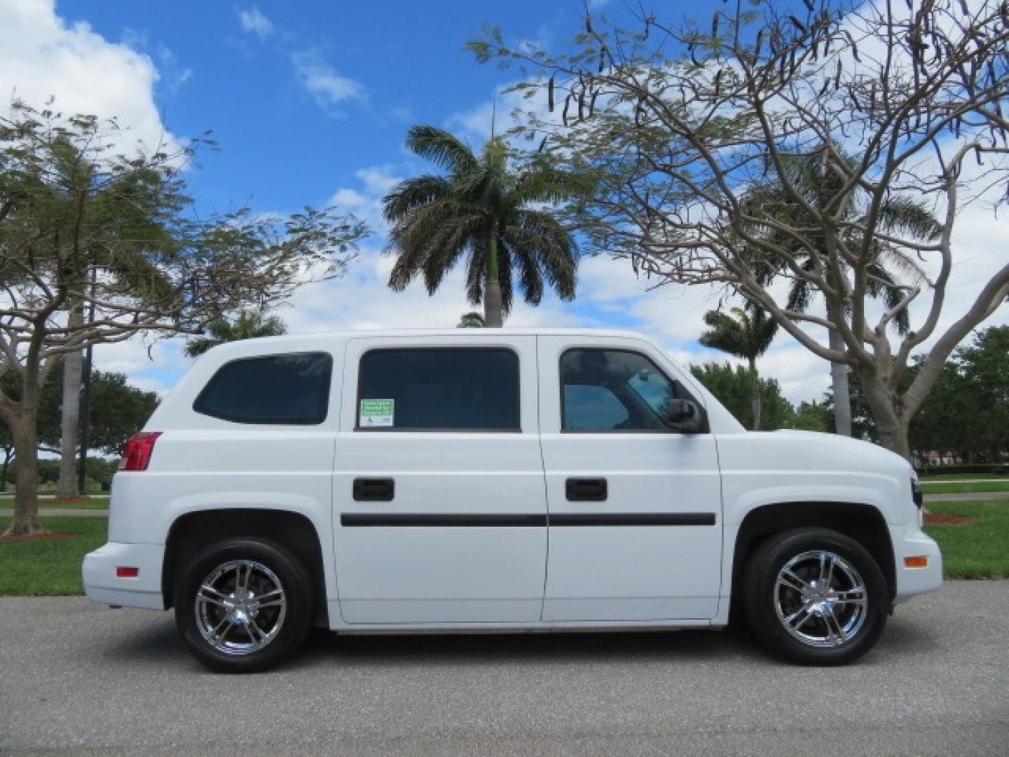 2012 White /Black with an 4.6L V8 engine, Automatic transmission, located at 4301 Oak Circle #19, Boca Raton, FL, 33431, (954) 561-2499, 26.388861, -80.084038 - You are looking at a Gorgeous 2012 Mobility Ventures MV1 Handicap Wheelchair Conversion Van with 64K Original Miles, 4.6L Ford V8, Bleack Leather Type Interior, Alloy Wheels, Power Side Entry Wheelchair Lift with Long Ramp and Short Ramp Function, Q Lock 150 EZ Lock, L-Track Tie Down System, Back Up - Photo#6